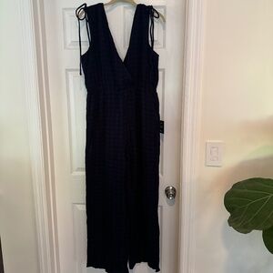 Favorite View Navy Blue Sleeveless Surplice Wide-Leg Jumpsuit